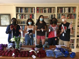 Group photo of students with Head of College Evans